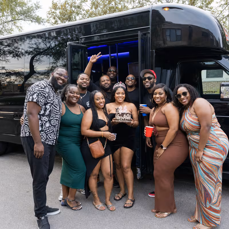 Party bus interior with wraparound leather seating and LED lighting in Orlando
