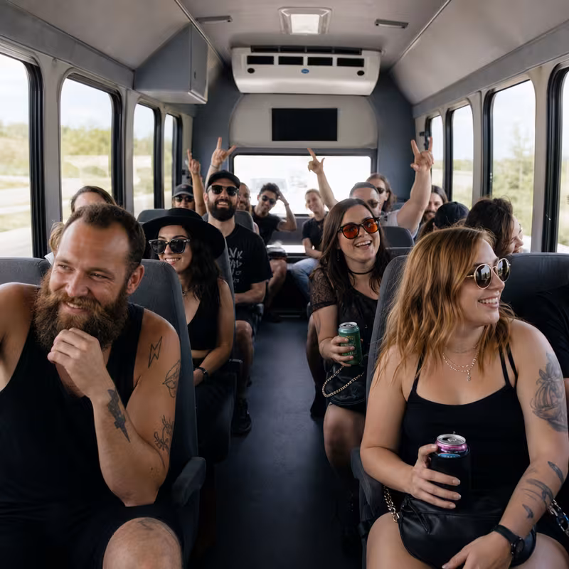 Party bus interior with wraparound leather seating and LED lighting in Orlando