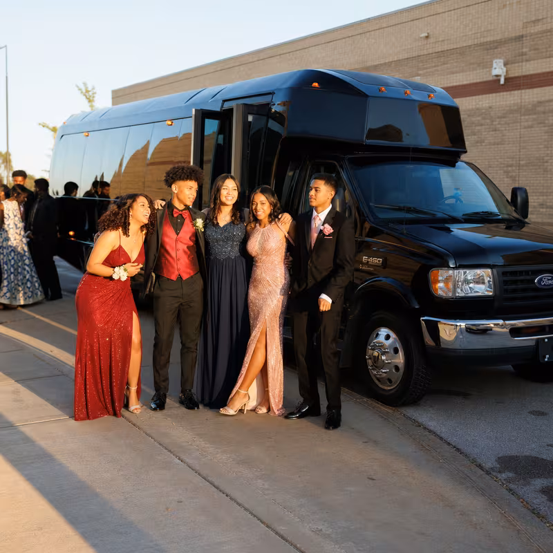 Group boarding a white charter bus for Prom & Homecoming Transportation transportation in Orlando