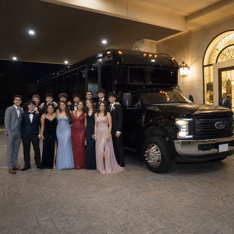Party bus interior with wraparound leather seating and LED lighting in Orlando