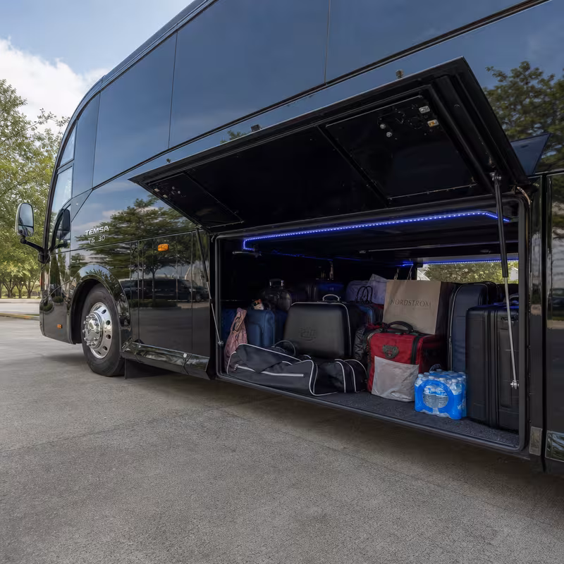Party bus interior with wraparound leather seating and LED lighting in Orlando