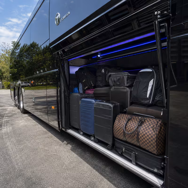 Party bus interior with wraparound leather seating and LED lighting in Orlando