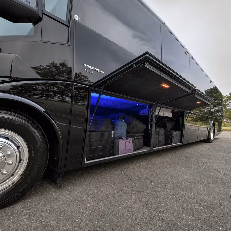 Party bus interior with wraparound leather seating and LED lighting in Orlando